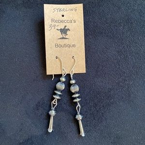 Never been worn sterling silver dangle earrings